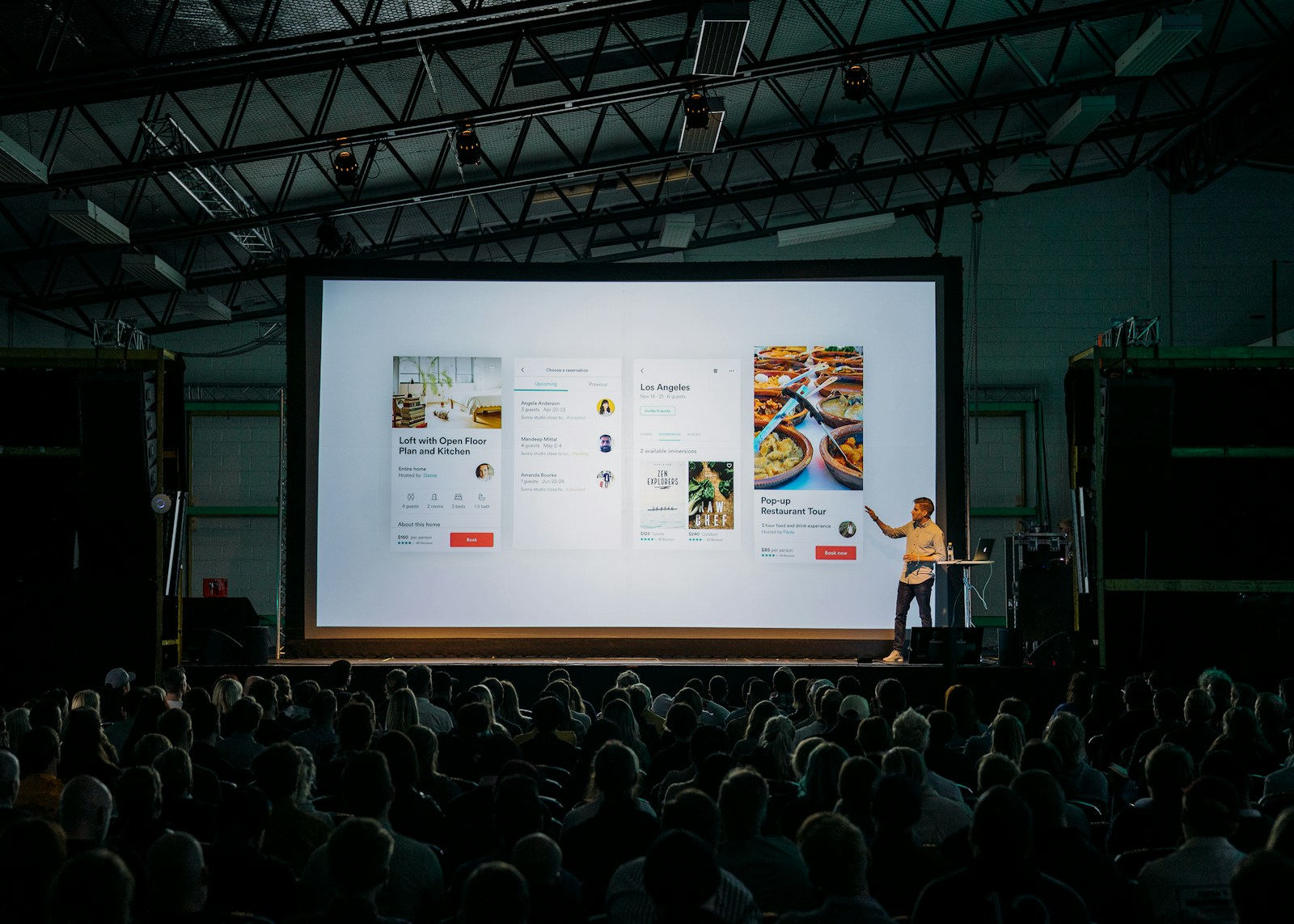 Speaker presenting to an audience at a corporate event